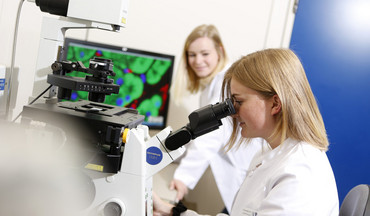 Two researchers in a lab